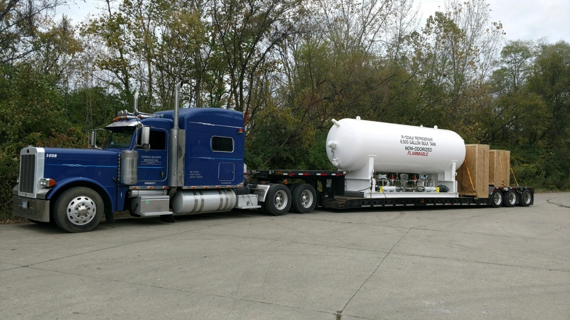 Flatbed loaded with tank